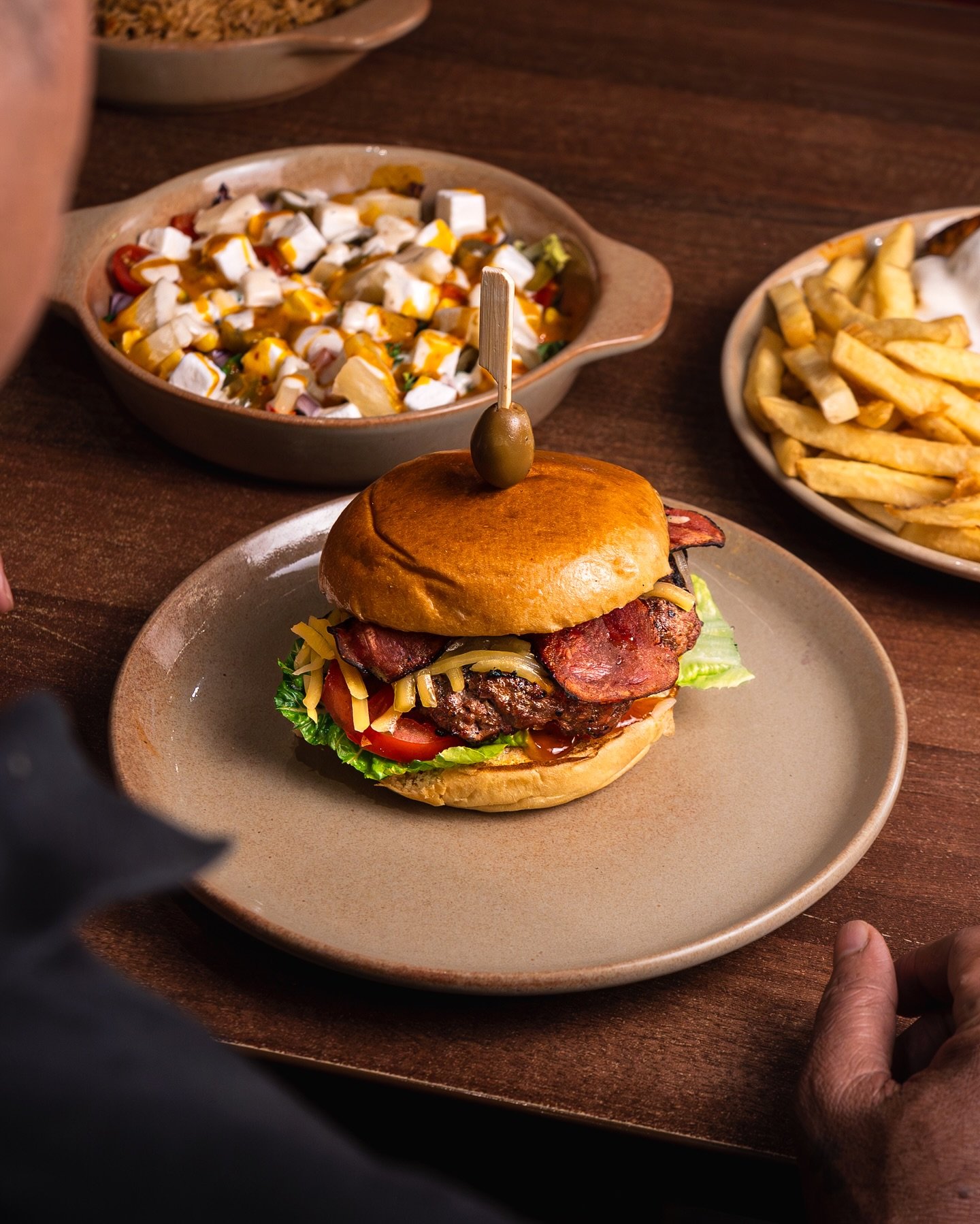 Manzanos peri peri burger with a Mediterranean feta salad